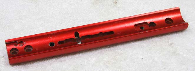 Red classic Automag rail, has front asa and back bottle screws drilled