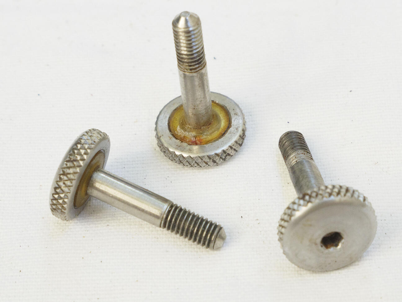 Modern Automag quickstrip screw, used with dirt or gunk in knurling.