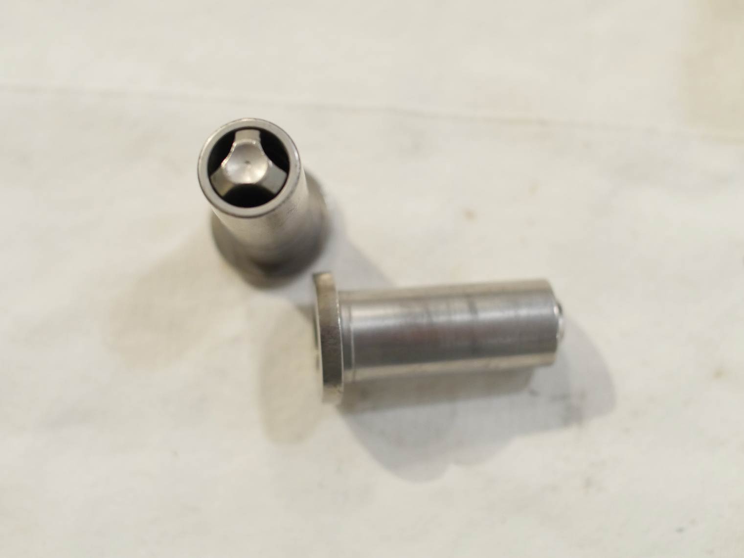 Stock AGD bolt in used shape, wear from sear