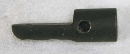 Flat duckbill asa, inlet on left side powdercoated matte black, has melted blue plastic, bad shape