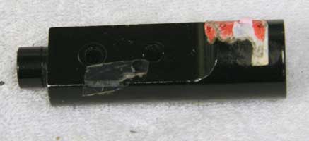 straight flat duckbill asa, inlet on front, has stickers and tape all over, decent shape