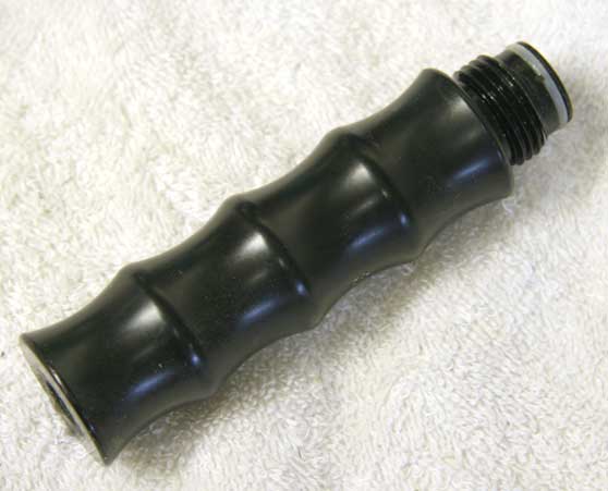 black gas through grip, used good shape, around 4 inches high