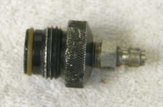male asa to female 1/8th npt, round knurled top used with wrench marks, has male qd fitting