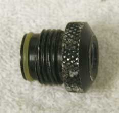 male asa to female 1/8th npt, round knurled top in used shape with wrench marks
