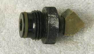 male asa to female 1/8th npt, round knurled top used with wrench marks with 45 fitting