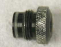 male asa to female 1/8th npt, round knurled top used with wrench marks, bad shape