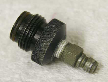 male asa to female 1/8th inch npt adaptor in used shape with male qd fitting