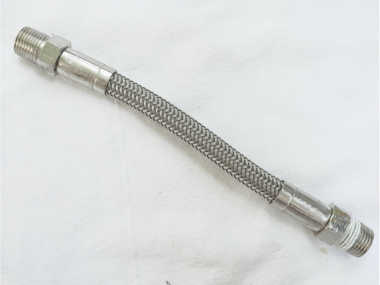 short stainless 5 inch braided line, used decent shape