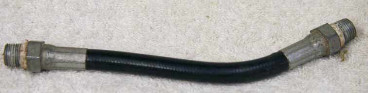 Old 6” black plastic hose, 2500psi rated would not recommend over 800 psi, used shape