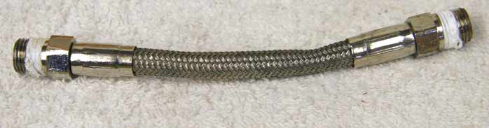 4.875 to 5 inch steel braided hose, used good shape