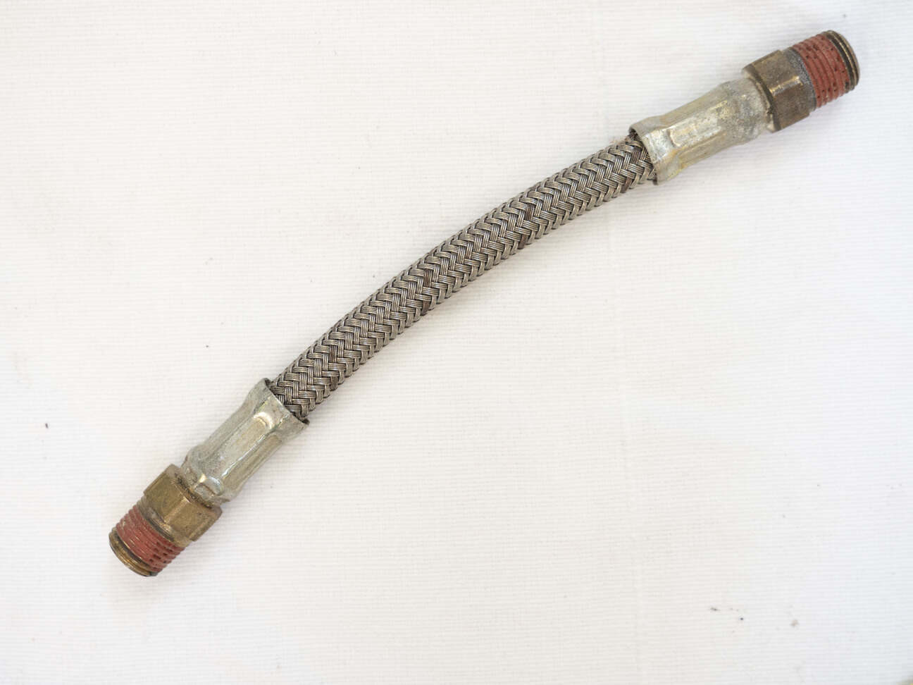 5.25” steel braided hose, used good shape