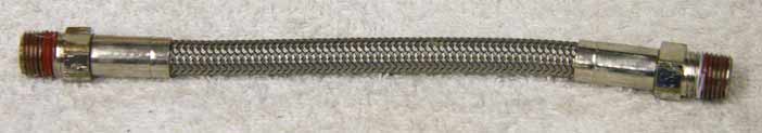 6” steel braided hose, used shape