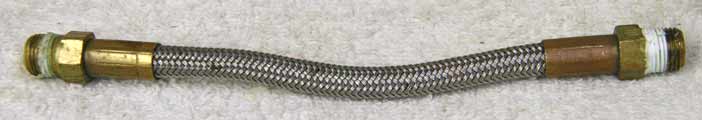 6” steel braided hose, used good shape, brass ends