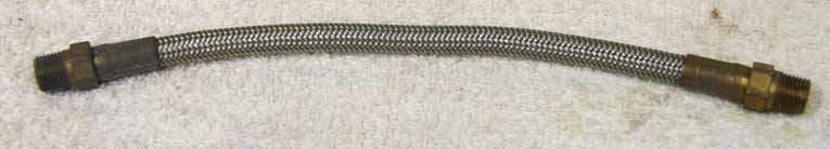 8” steel braided hose, good shape, has brass ends