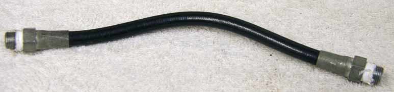 Old 8” black plastic hose, 2500psi rated would not recommend over 800 psi, good shape