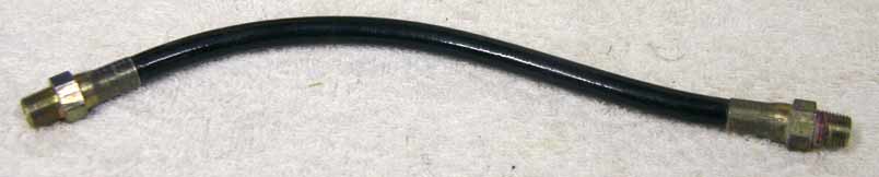 Old 9.5” black plastic hose, 2500psi rated would not recommend over 800 psi, good shape