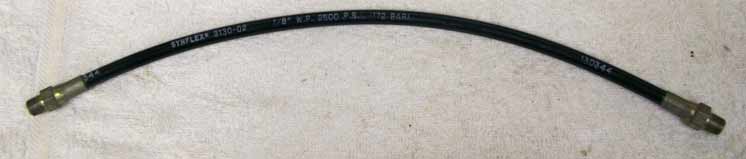 Old 16.25” black plastic hose, 2500psi rated would not recommend over 800 psi, good shape