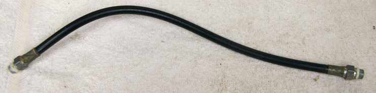 Old 14.25” black plastic hose, 2500psi rated would not recommend over 800 psi, used shape