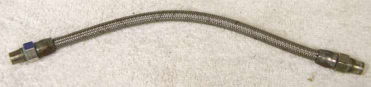 9.875” steel braided hose, used good shape but ends have corrosion/rust