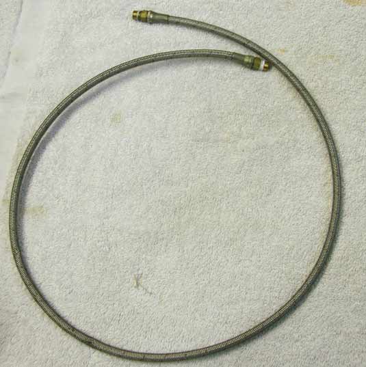 44” steel braided hose in good shape with brass ends