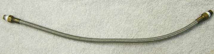 16” steel braided hose in great shape with brass ends