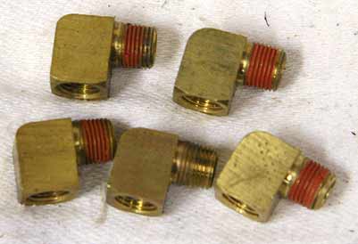 new shape or very good shape brass 90 degree 1/8th inch npt fitting,  One included.