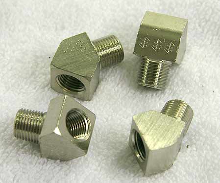 chrome plated 45 degree 1/8th npt fittings, new, one included