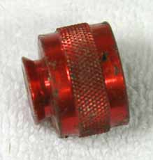 bad shape/dirty red aluminum thread cover, with bleed