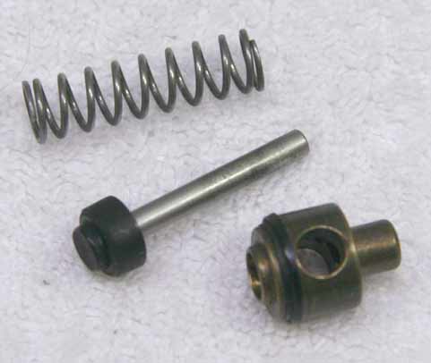 Used Full brass cocker valve, later black cup seal, with heavy mainspring.