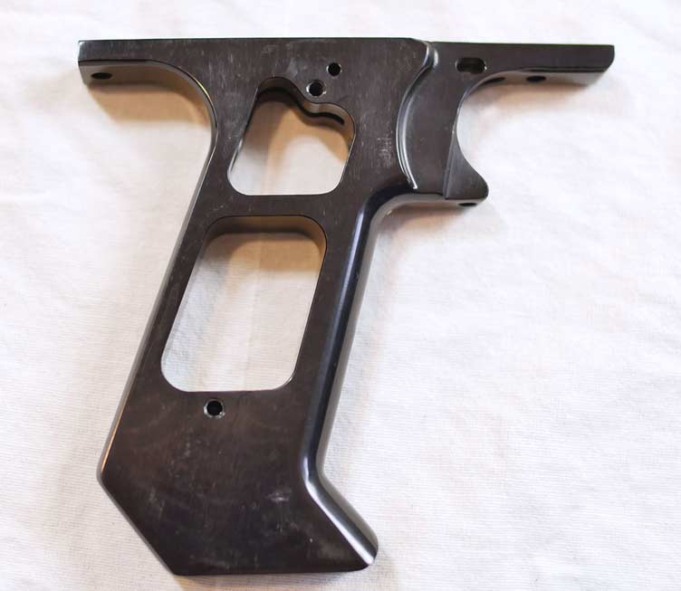 Autococker 45 drop frame with cut trigger guard. Guard cut prior to ano
