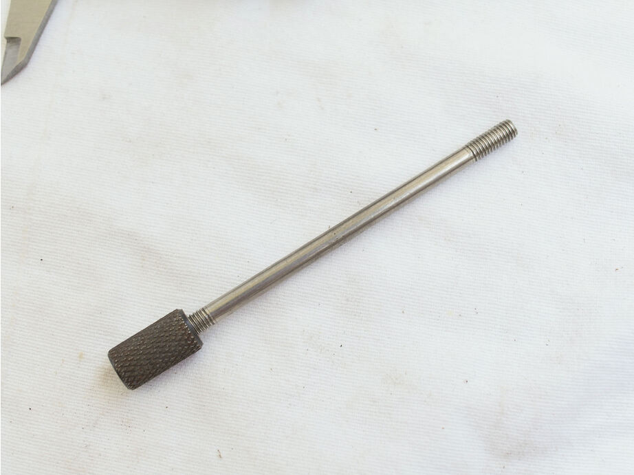 Used but good shape cocking rod with set locking nut, stainless and steel