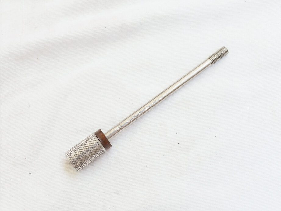 Chrome plated knurled cocking rod, with wrench marks, used shape