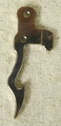 cocker hinge trigger, chrome plated aluminum, probably not wgp but aim, new