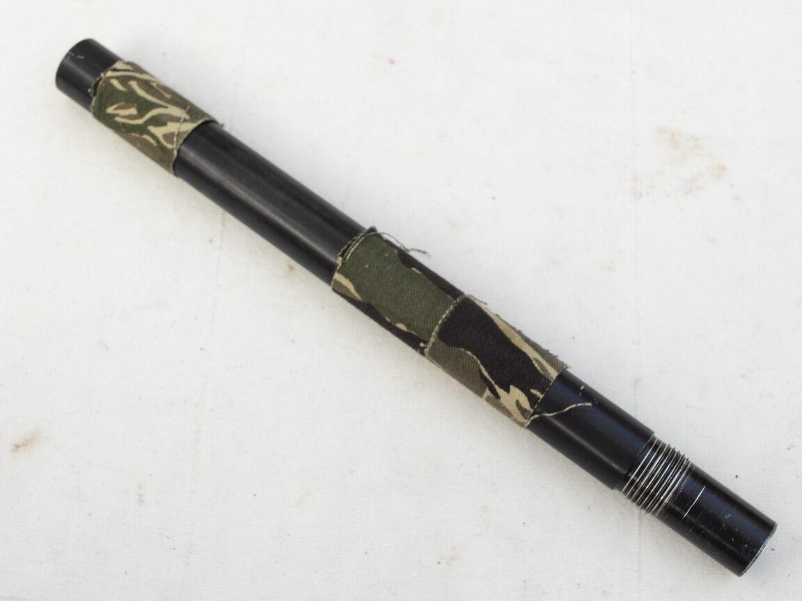 F1 Illustrator or Raptor brass lined barrel with camo tape, maybe cut down?