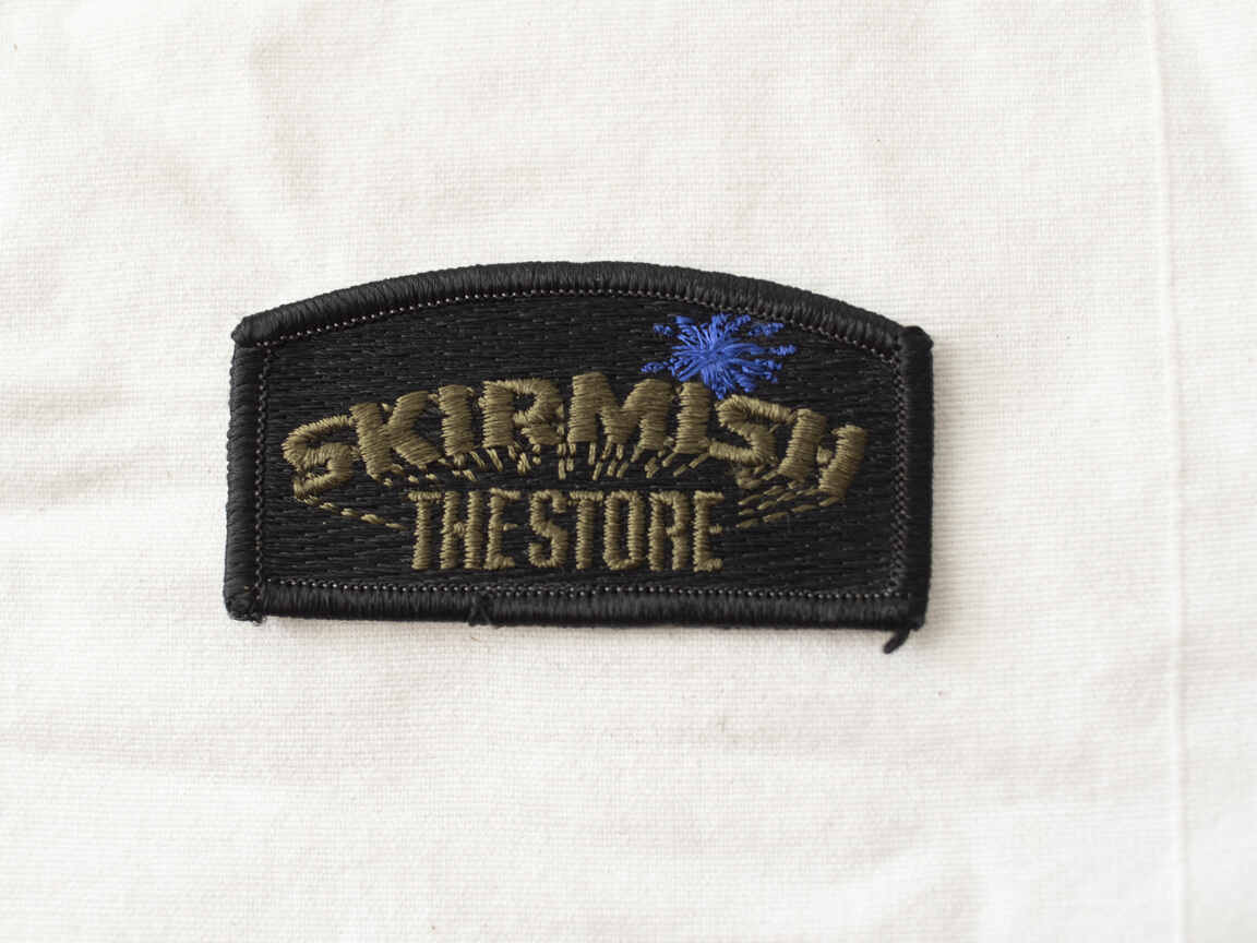Skirmish Store patch, blue splat, new shape, 
