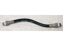 Old 6.75” black plastic hose, 2500psi rated would not recommend over 800 psi, used decent shape, has bend to it