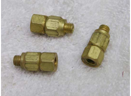 Male to female 10x32 with swivel in center, brass pneumatic fitting, new.