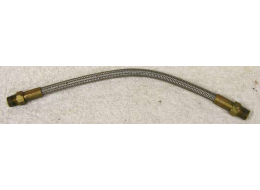 8.75” steel braided hose with brass ends in good shape with light wrench marks