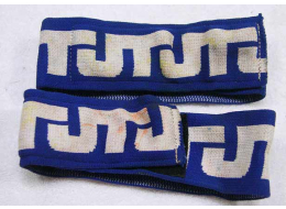 White and Blue JT arm band, used