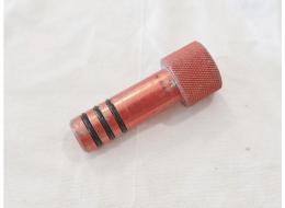 Red long aluminum knurled barrel plug. Used shape