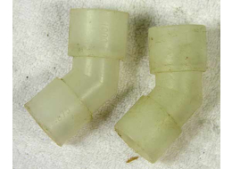 white and opaque clear plastic paintball elbows .875 x 1 inch. Used shape.