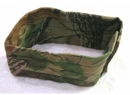 Green camo neck protector.  Has some gunk inside, might absorb water?