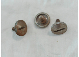 10x32 thumbscrew in steel with rust, likely from USI Eliminators.
