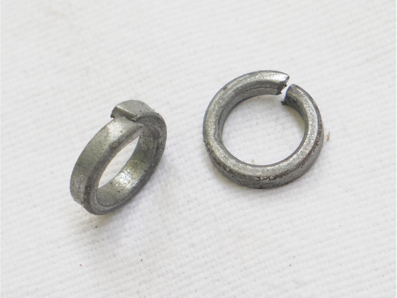 ACI F4 Illustrator or Griffin grip frame screw washer, used shape