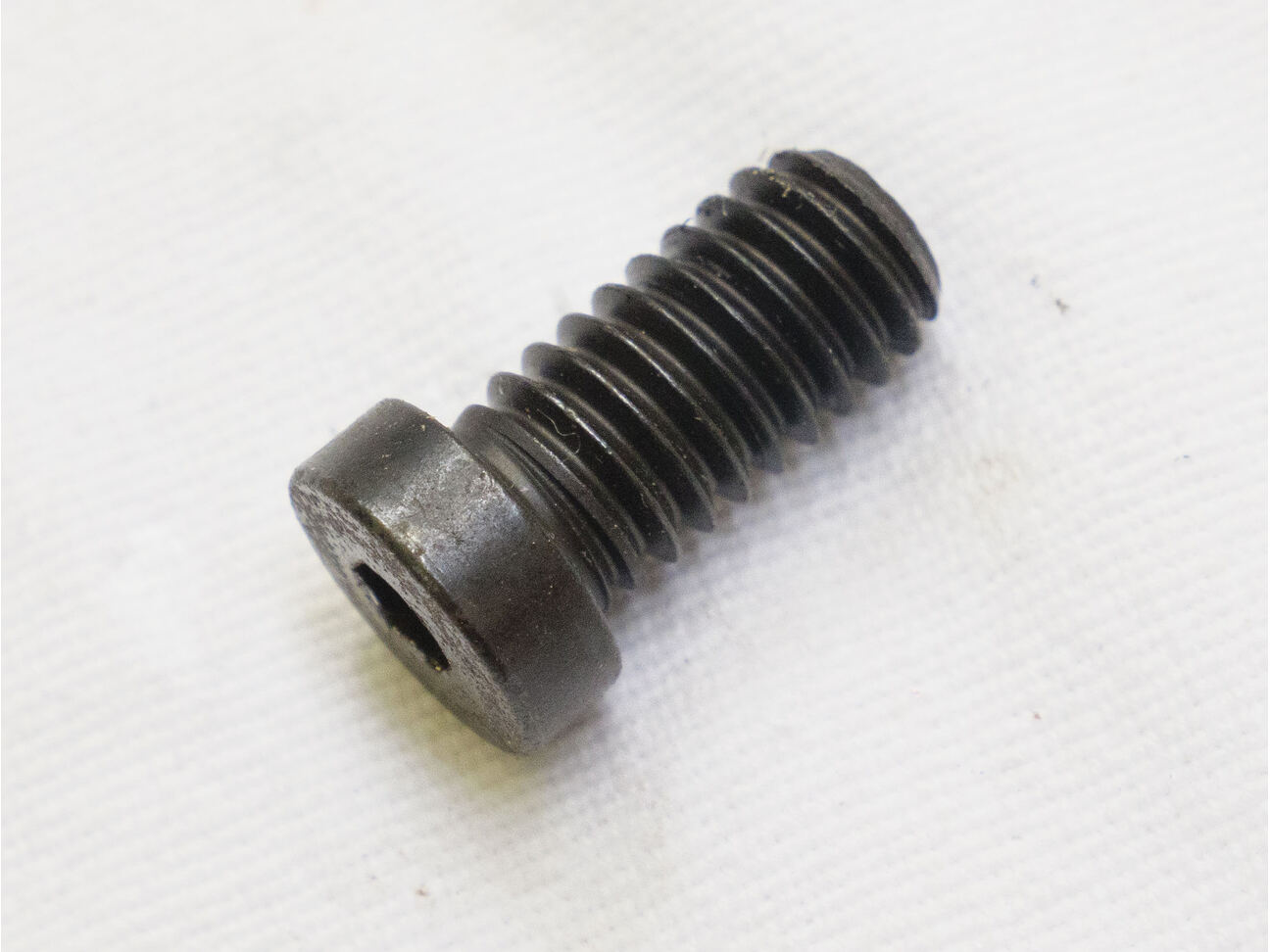 F4 Illustrator back grip frame screw, used good shape