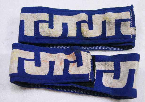 White and Blue JT arm band, used