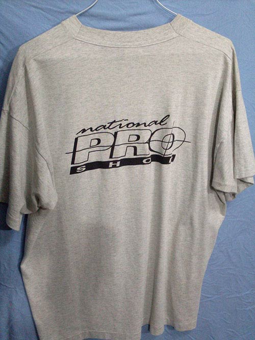 National Pro Shop shirt, has some paint stains on the front. Size XL