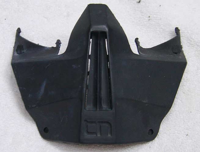 Vents lower with back end foam inside. Black plastic.