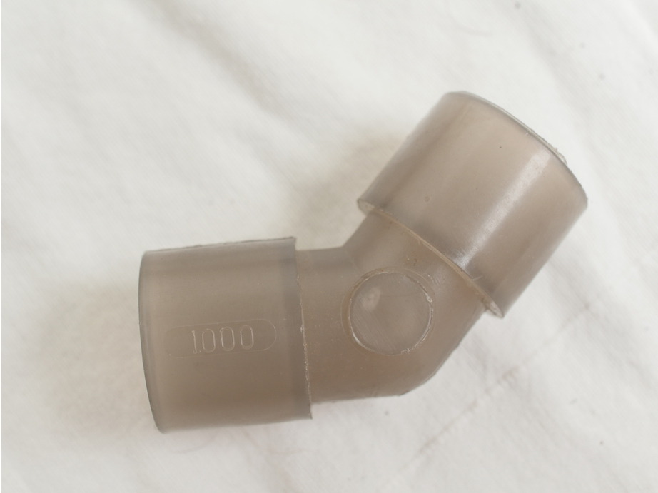 1 inch by 1.040 inch elbow in grey plastic, new shape, USI old stock