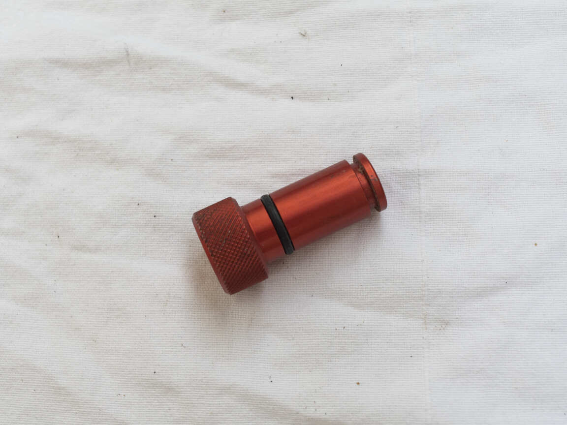 Red anodized Aluminum barrel plug, decent shape